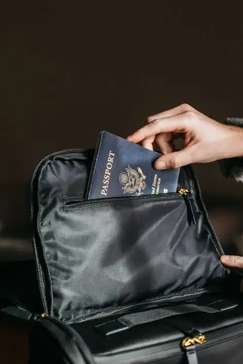 Passport and Visa put into a bag